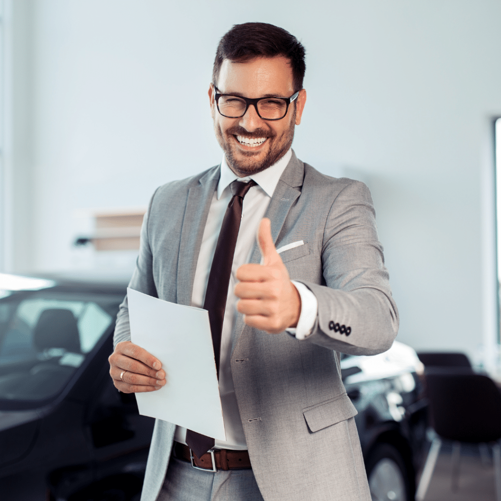 Businessman Giving A Thumbs up Gesture