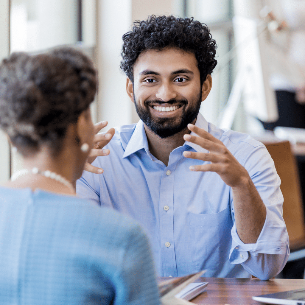 Man Happily Explaining
