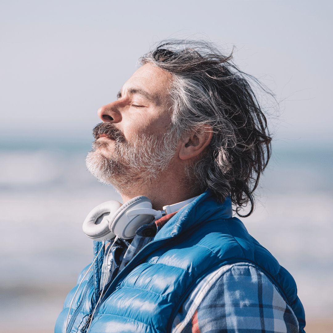 Man Smelling Fresh Air